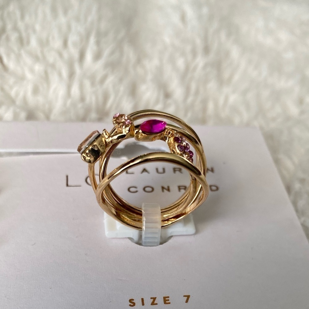NWT LC Lauren Conrad Rose Gold Tone
Clear Simulated Stones & Wavy Bands Ring Set